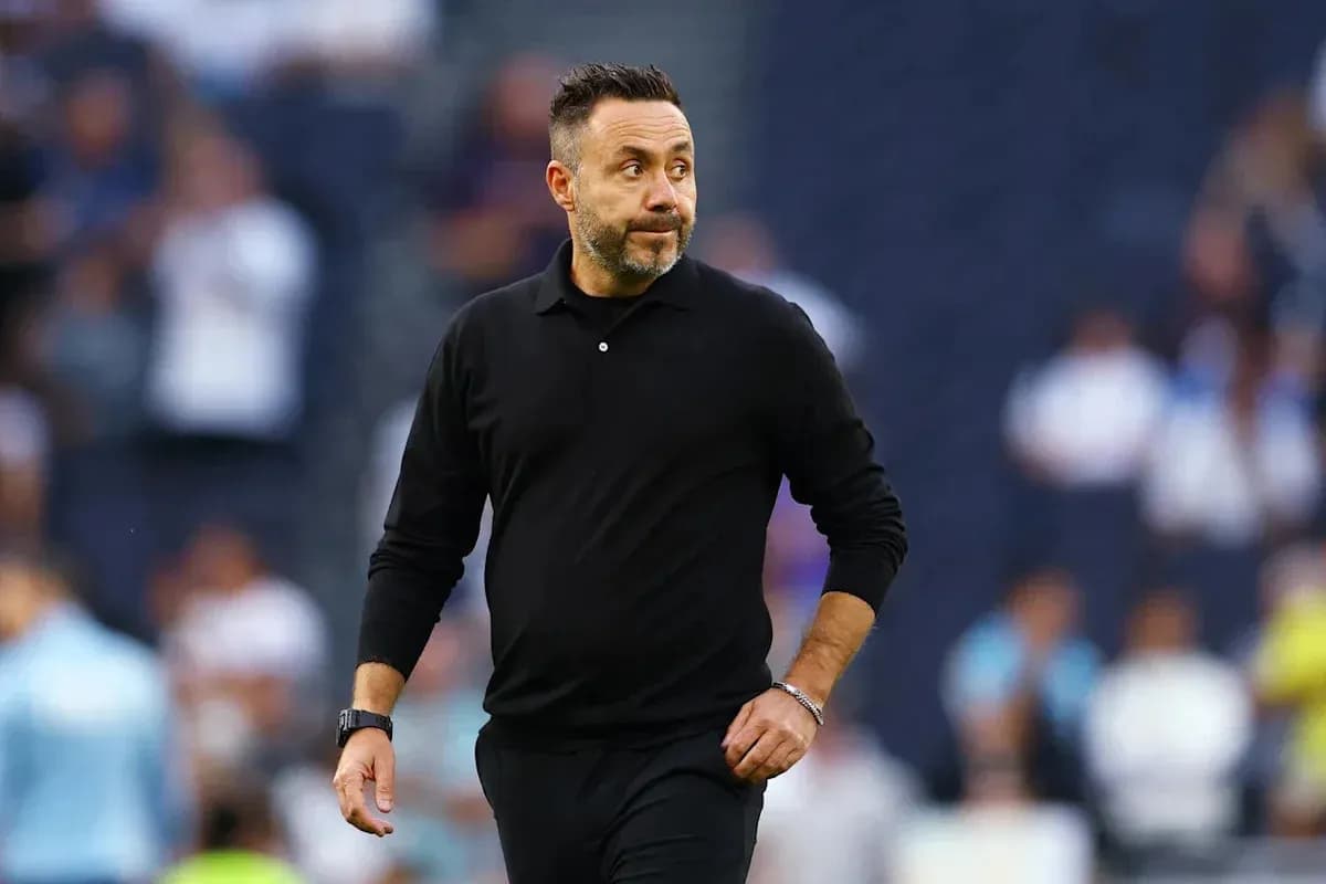 Coach walking on the sidelines during a match Coach walking on the sidelines during a match