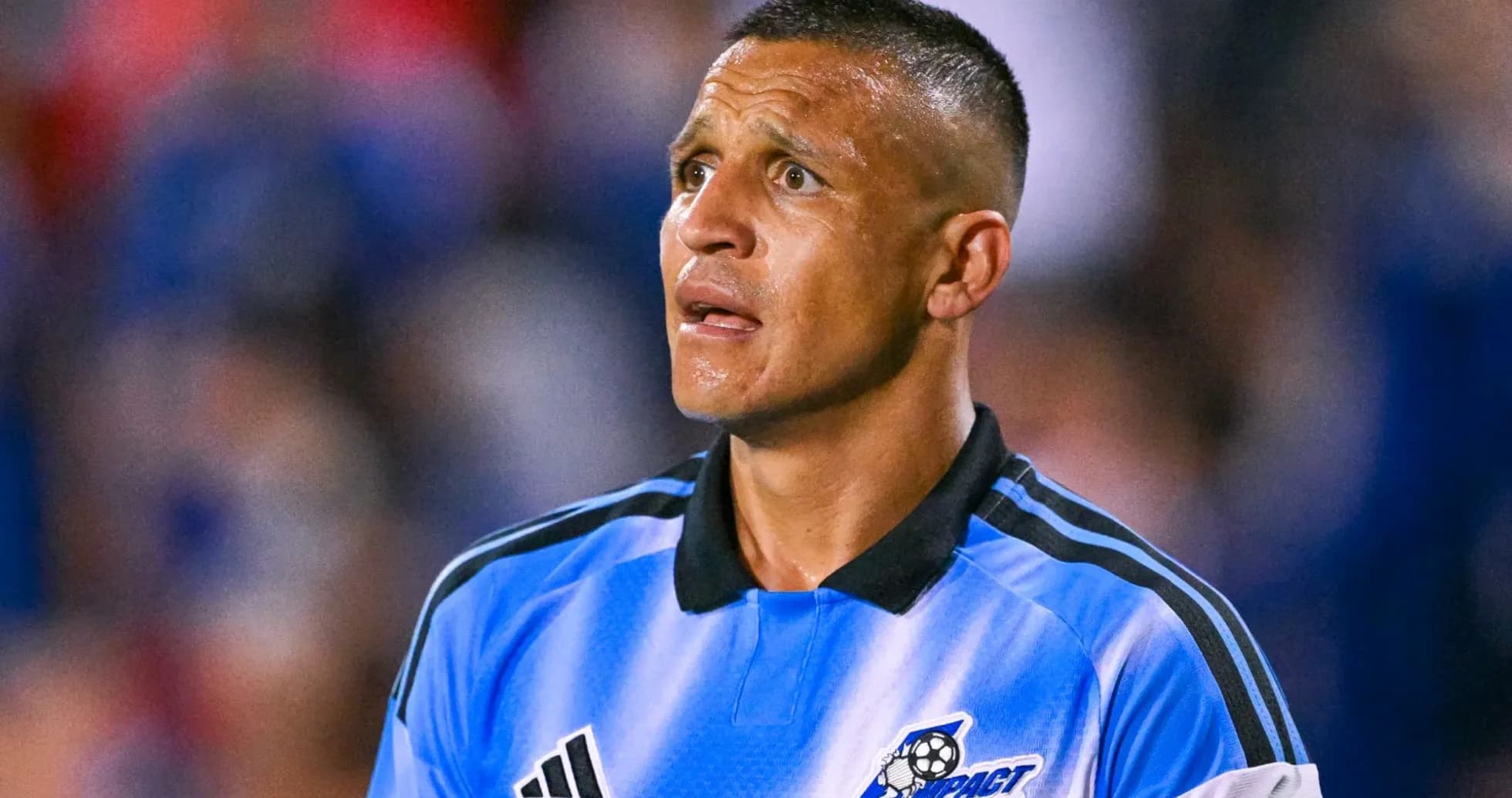 Goalkeeper in blue jersey during soccer match Goalkeeper in blue jersey during soccer match