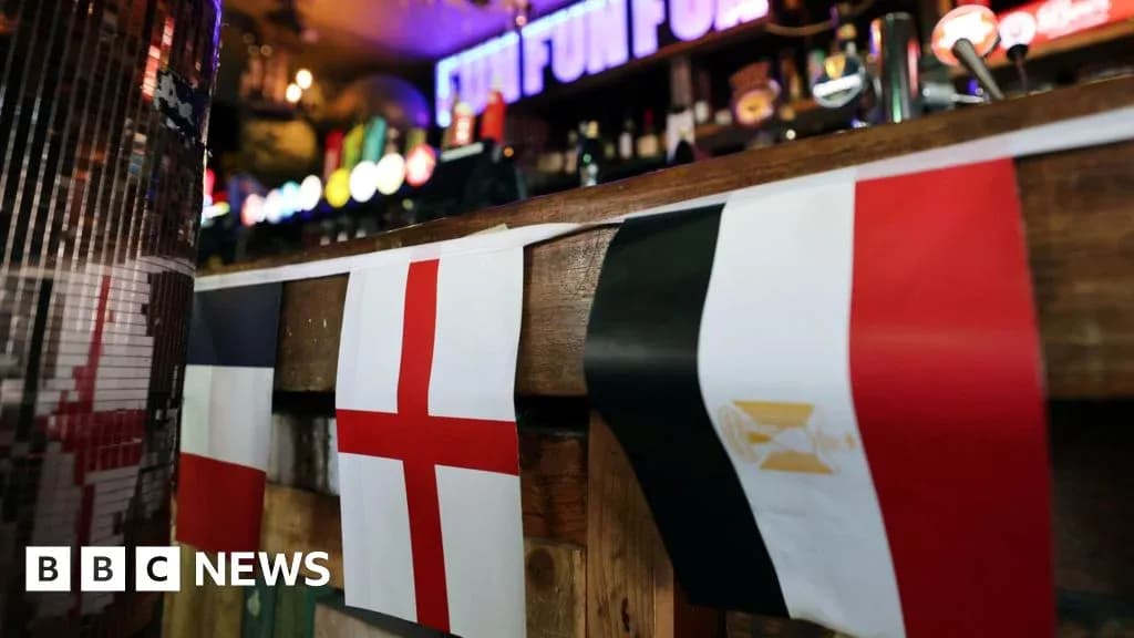 Flags of England, France, and Egypt displayed in bar Flags of England, France, and Egypt displayed in bar