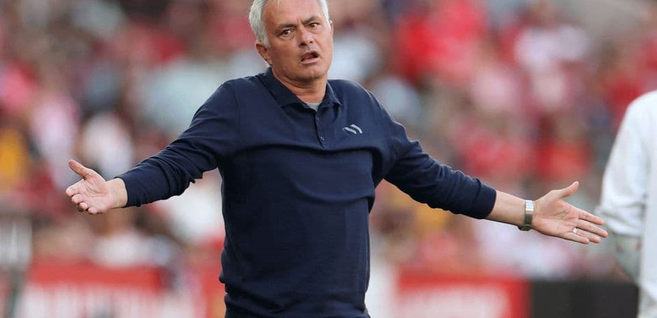 Manager gesturing during a match on the sidelines Manager gesturing during a match on the sidelines