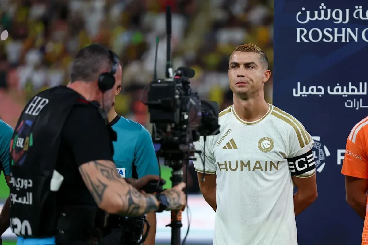 Cristiano Ronaldo standing with camera crew before match Cristiano Ronaldo standing with camera crew before match