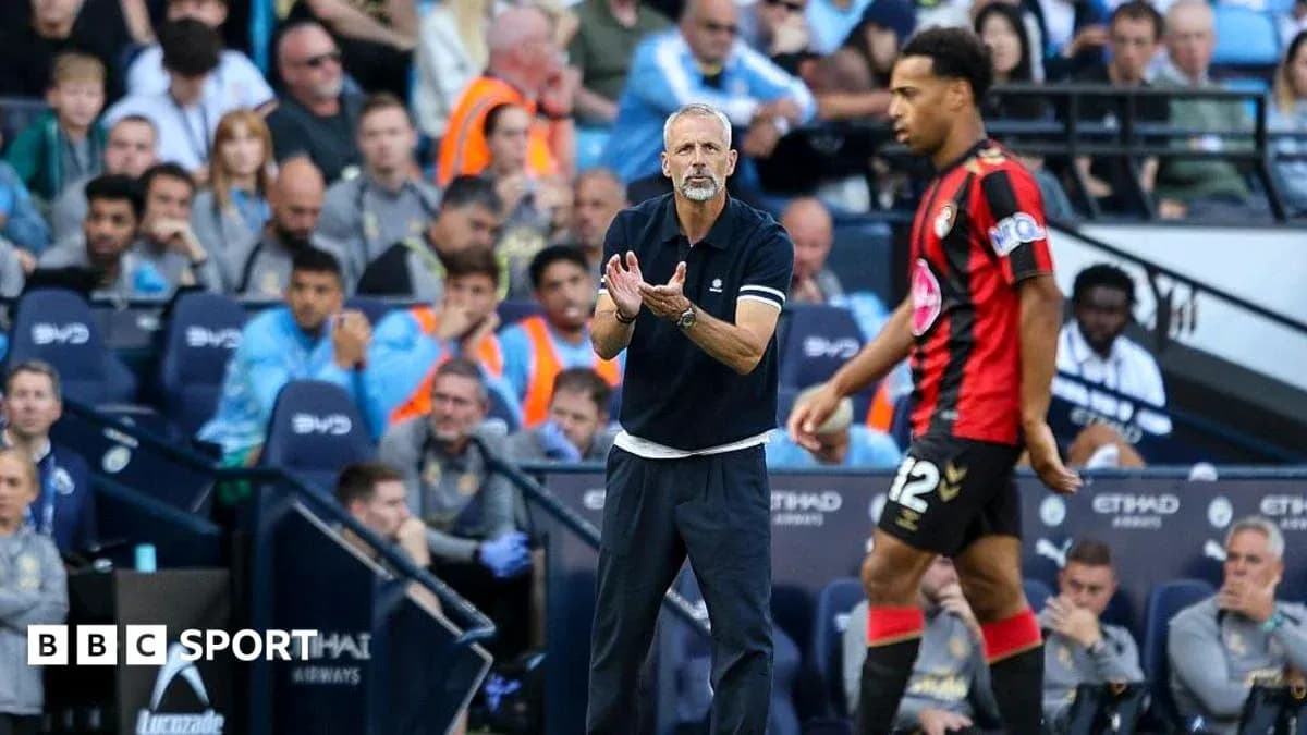 Bournemouth coach instructing player during match Bournemouth coach instructing player during match