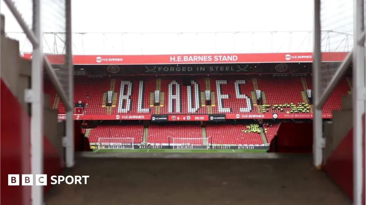 Stadium view with 'BLADES' displayed in stands Stadium view with 'BLADES' displayed in stands