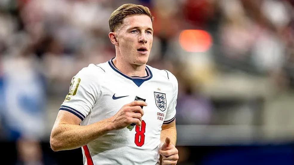 Player wearing England kit running on the field Player wearing England kit running on the field
