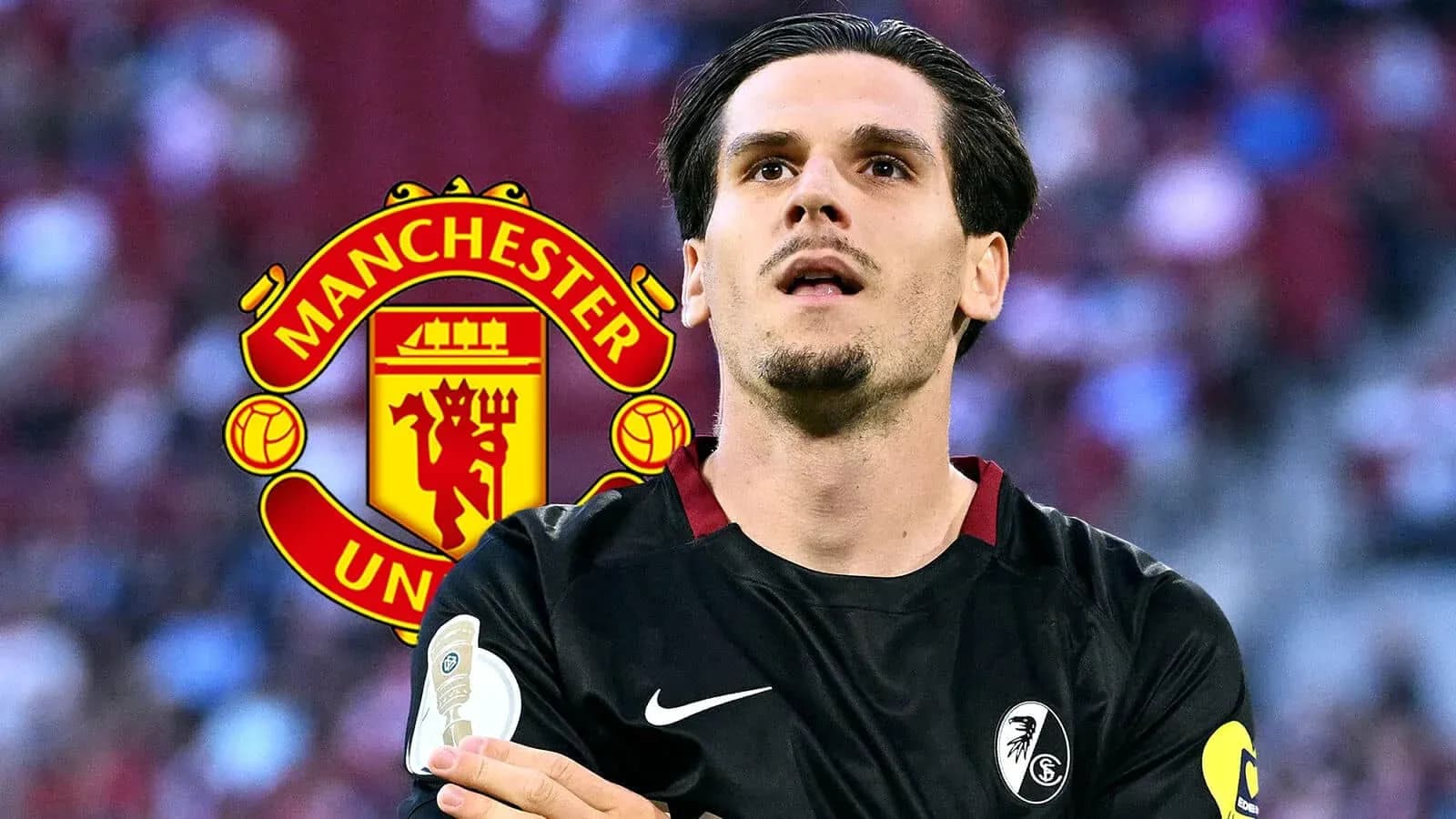 Player in black kit with Manchester United logo backdrop Player in black kit with Manchester United logo backdrop