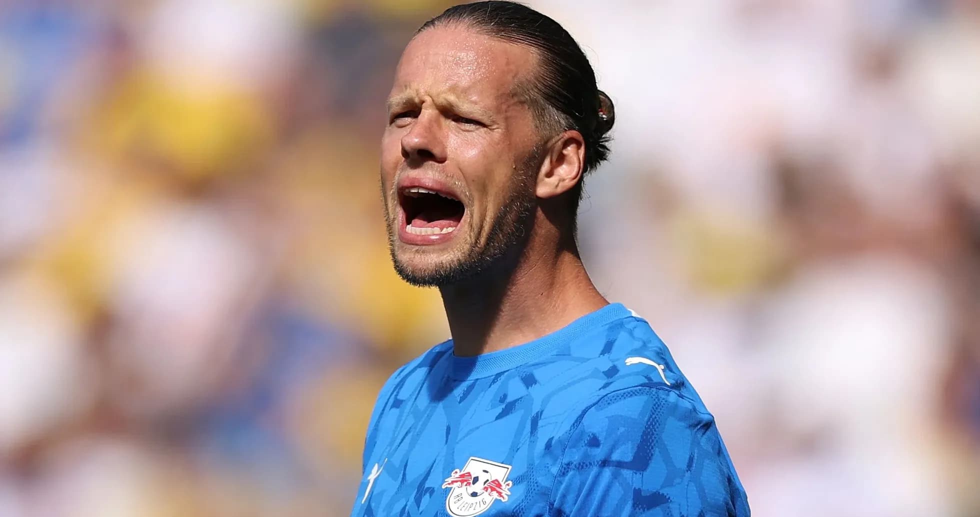 Goalkeeper shouting during a football match Goalkeeper shouting during a football match