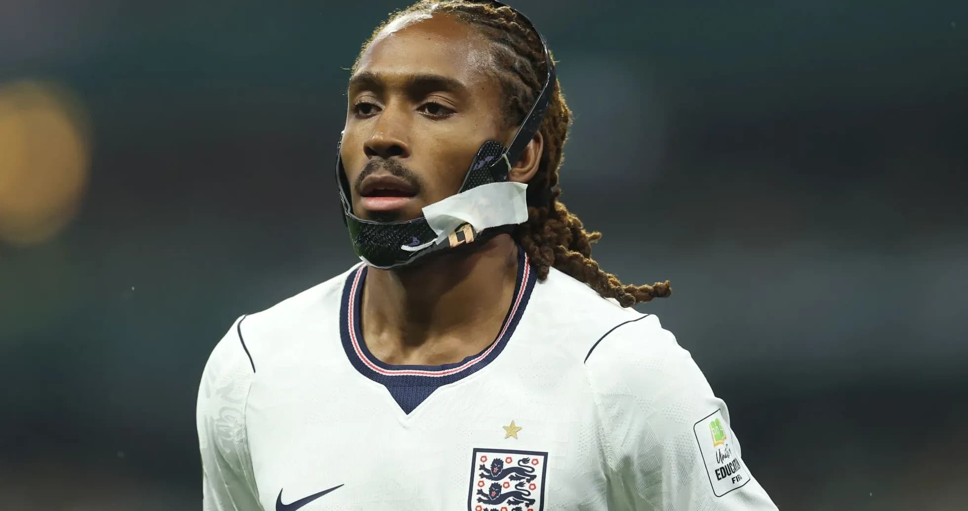 Player wearing protective mask during match Player wearing protective mask during match