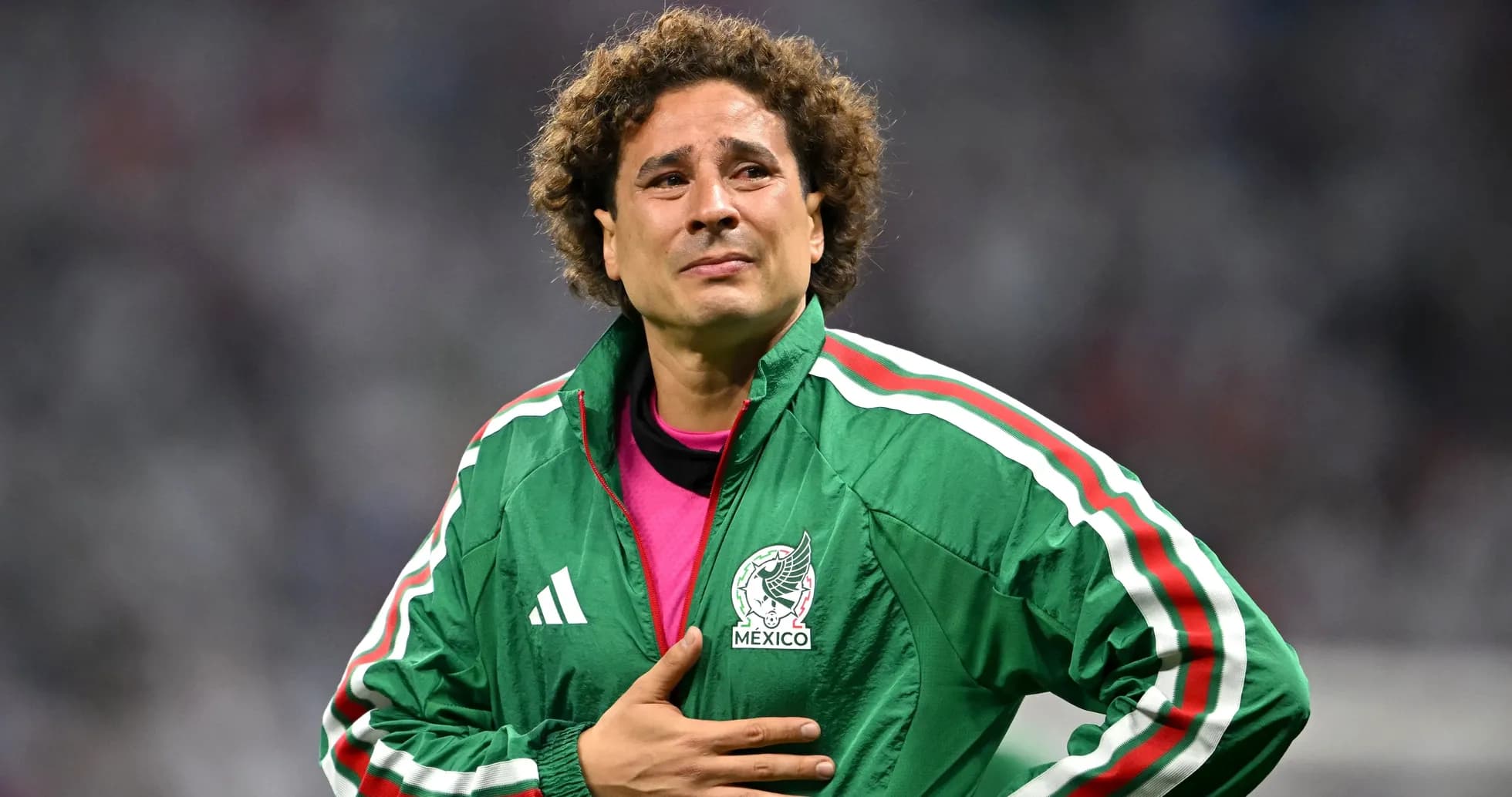 Goalkeeper wearing Mexico jacket on the field Goalkeeper wearing Mexico jacket on the field