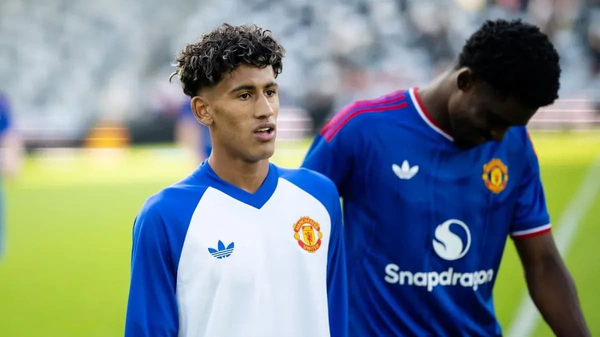Two Manchester United players warming up before match Two Manchester United players warming up before match