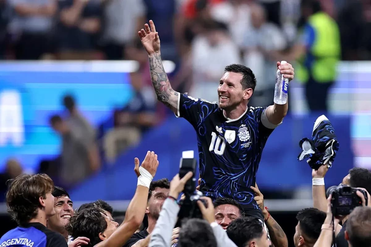 Player being celebrated by teammates after victory Player being celebrated by teammates after victory