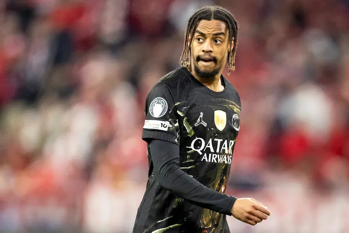 Player in black jersey during football match Player in black jersey during football match