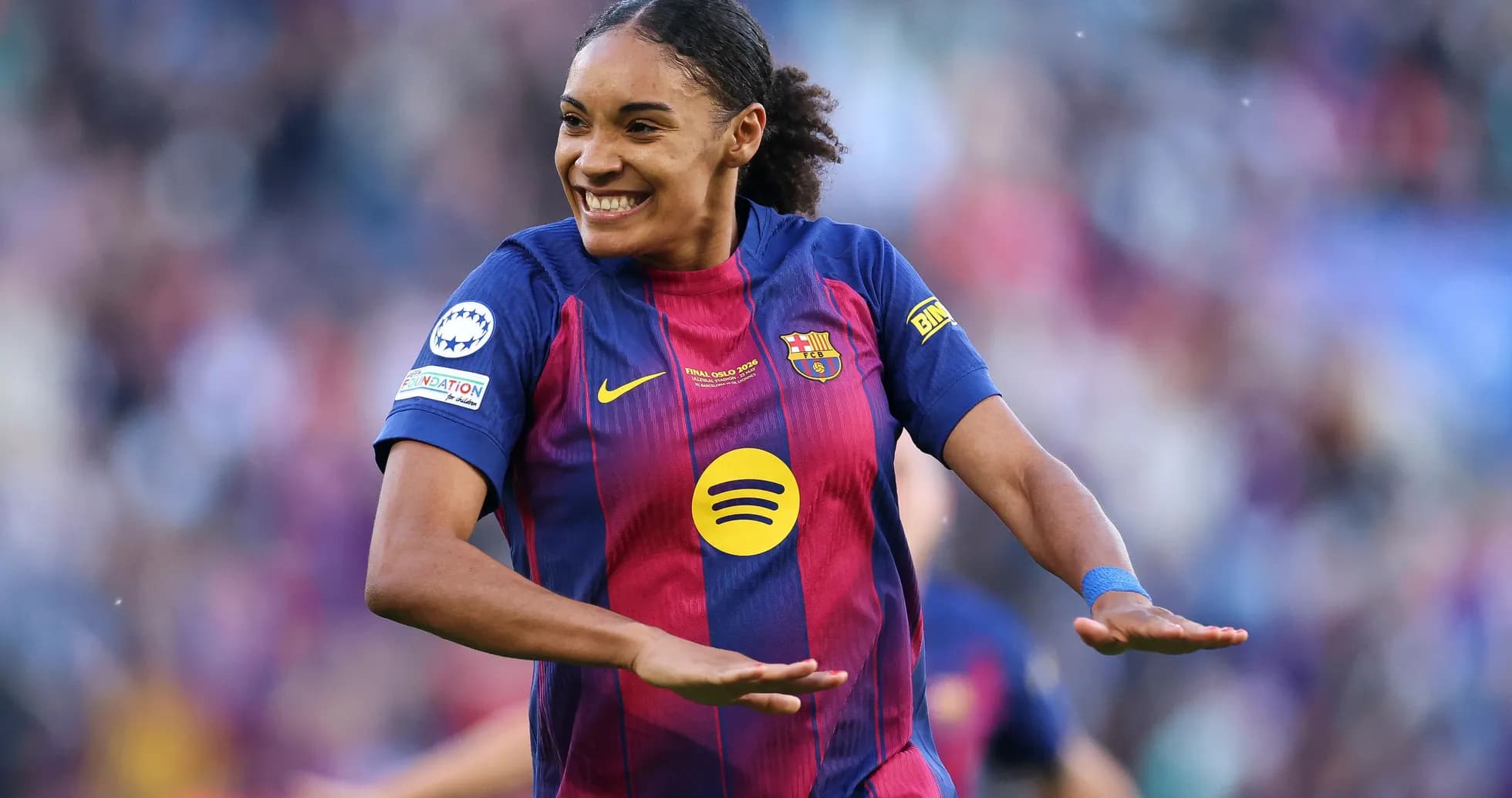 Player celebrating after scoring a goal for Barcelona Player celebrating after scoring a goal for Barcelona