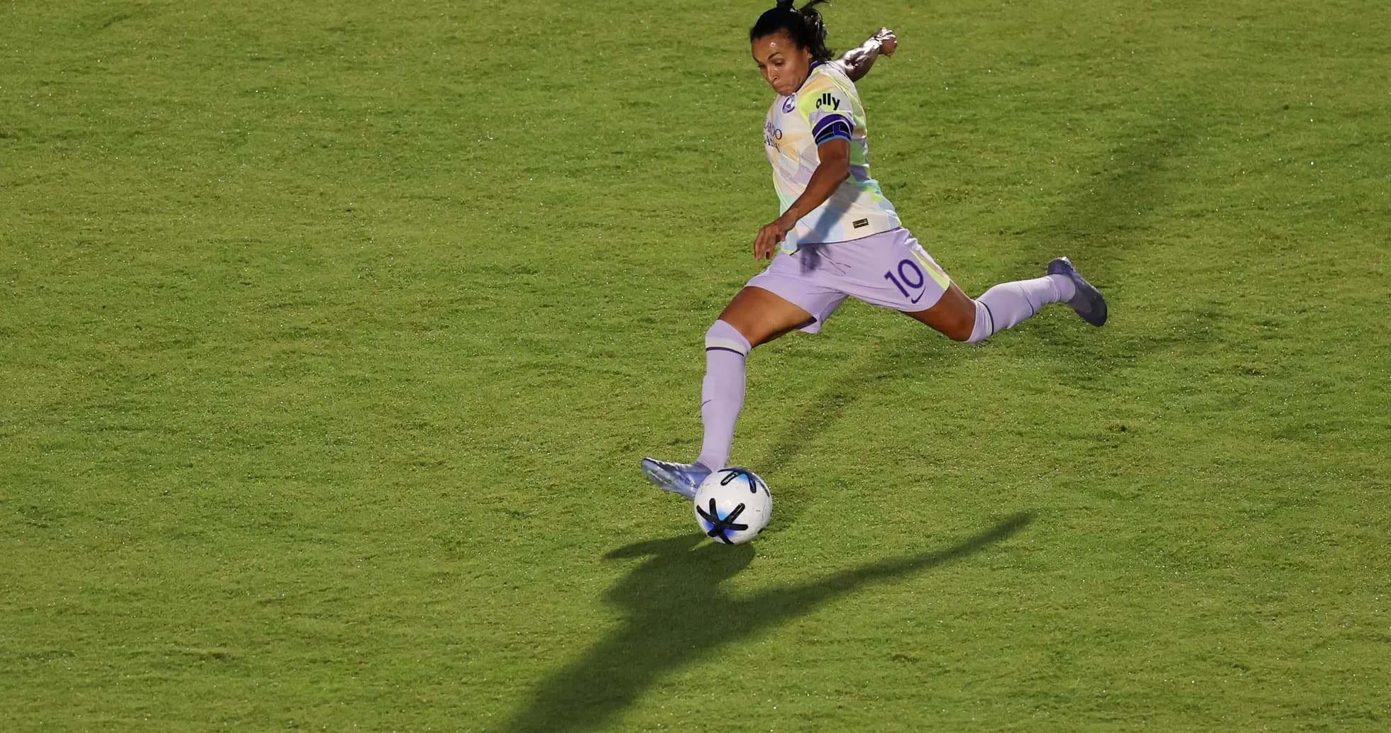 Player kicking the ball during NWSL match Player kicking the ball during NWSL match