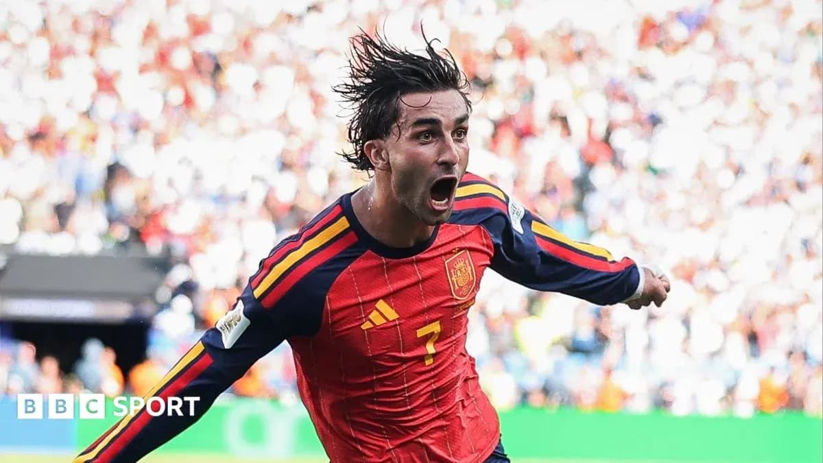 Player celebrating after scoring for Spain Player celebrating after scoring for Spain