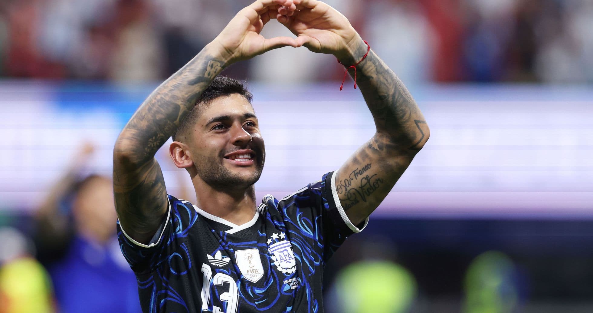 Player celebrating with heart gesture after match Player celebrating with heart gesture after match