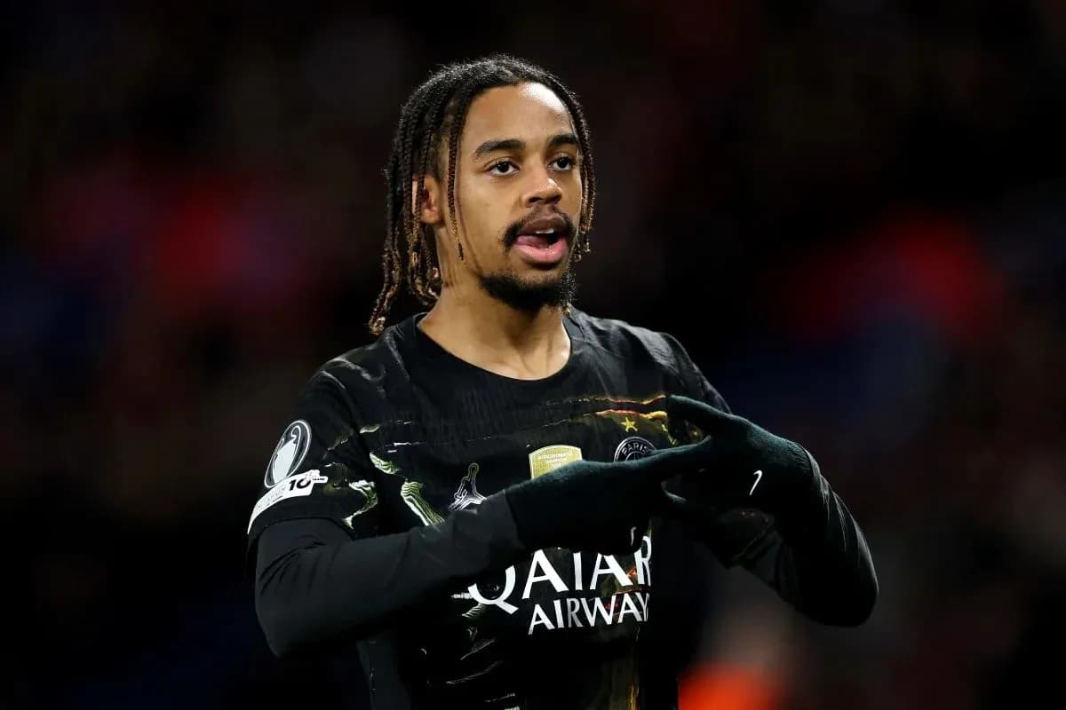 Player gesturing during a football match Player gesturing during a football match