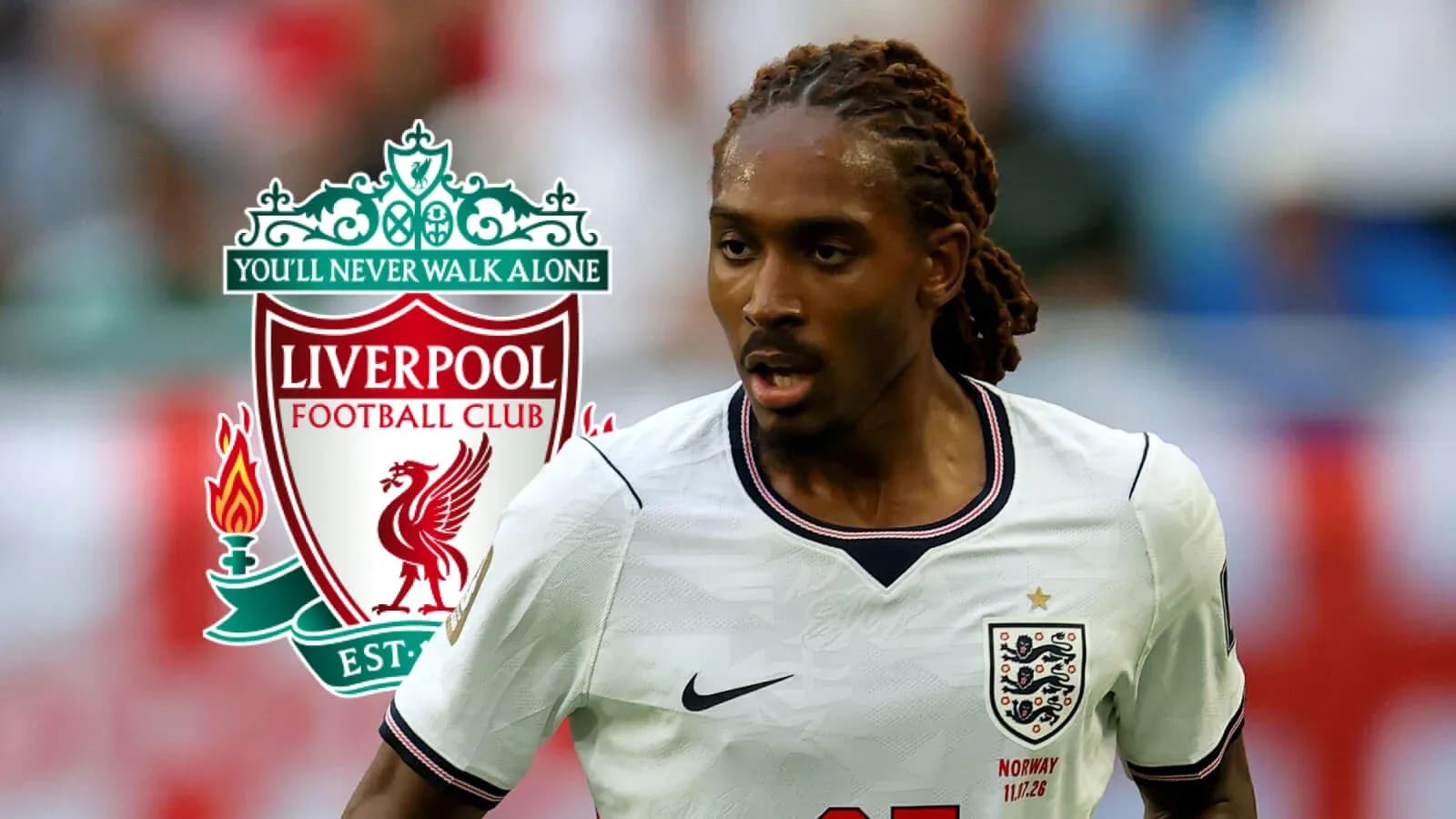 Player running on the field with Liverpool logo Player running on the field with Liverpool logo