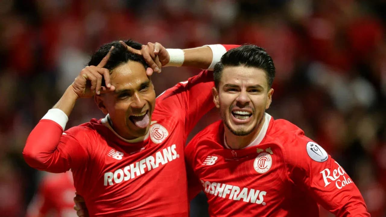 Toluca players celebrating a goal during match Toluca players celebrating a goal during match