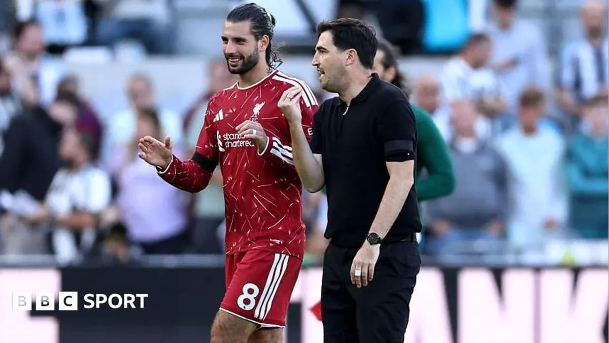 Player and coach discussing during match Player and coach discussing during match