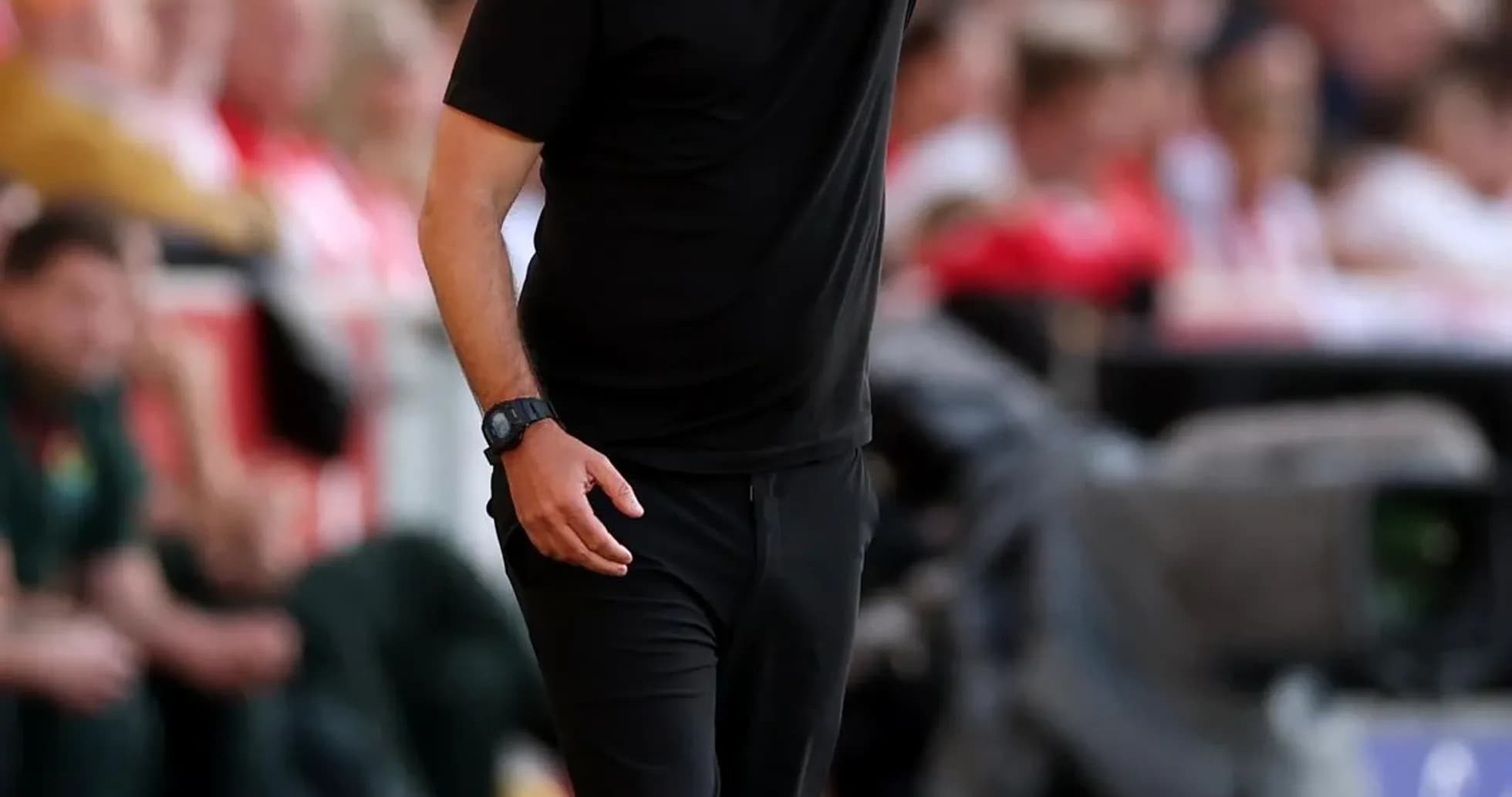 Manager directing players from the sideline during match Manager directing players from the sideline during match