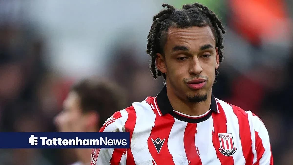 Stoke City player wearing red and white striped jersey Stoke City player wearing red and white striped jersey
