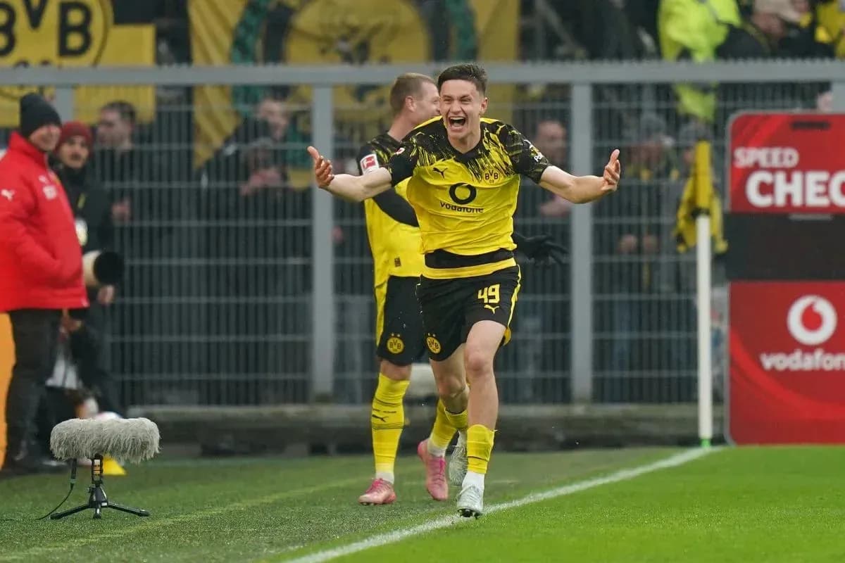 Player celebrating goal during Borussia Dortmund match Player celebrating goal during Borussia Dortmund match
