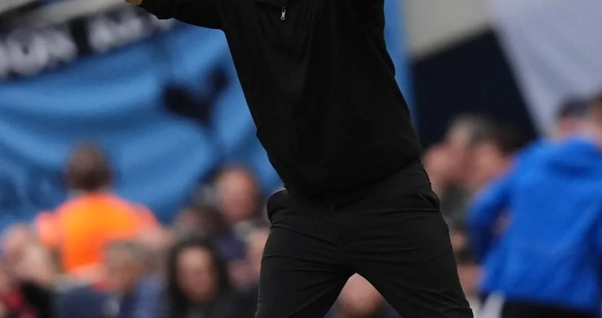Coach gesturing on the sidelines during match Coach gesturing on the sidelines during match