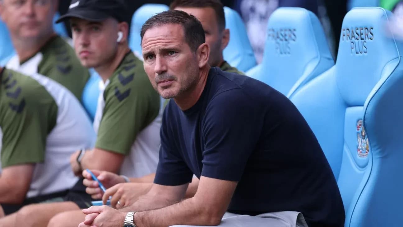 Coach sitting on bench during match Coach sitting on bench during match