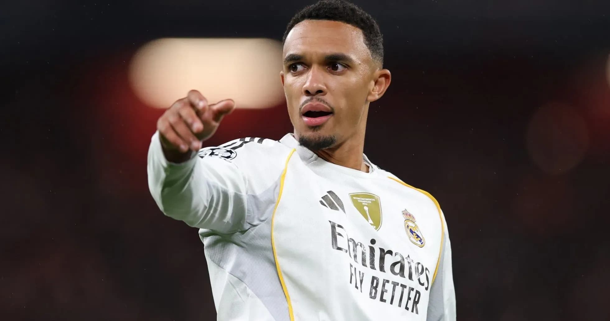 Player gesturing during a football match Player gesturing during a football match