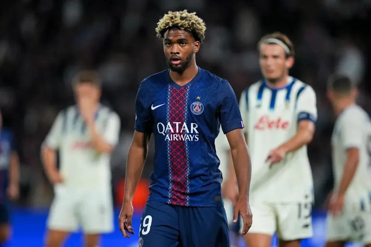 PSG player walking on pitch during match PSG player walking on pitch during match