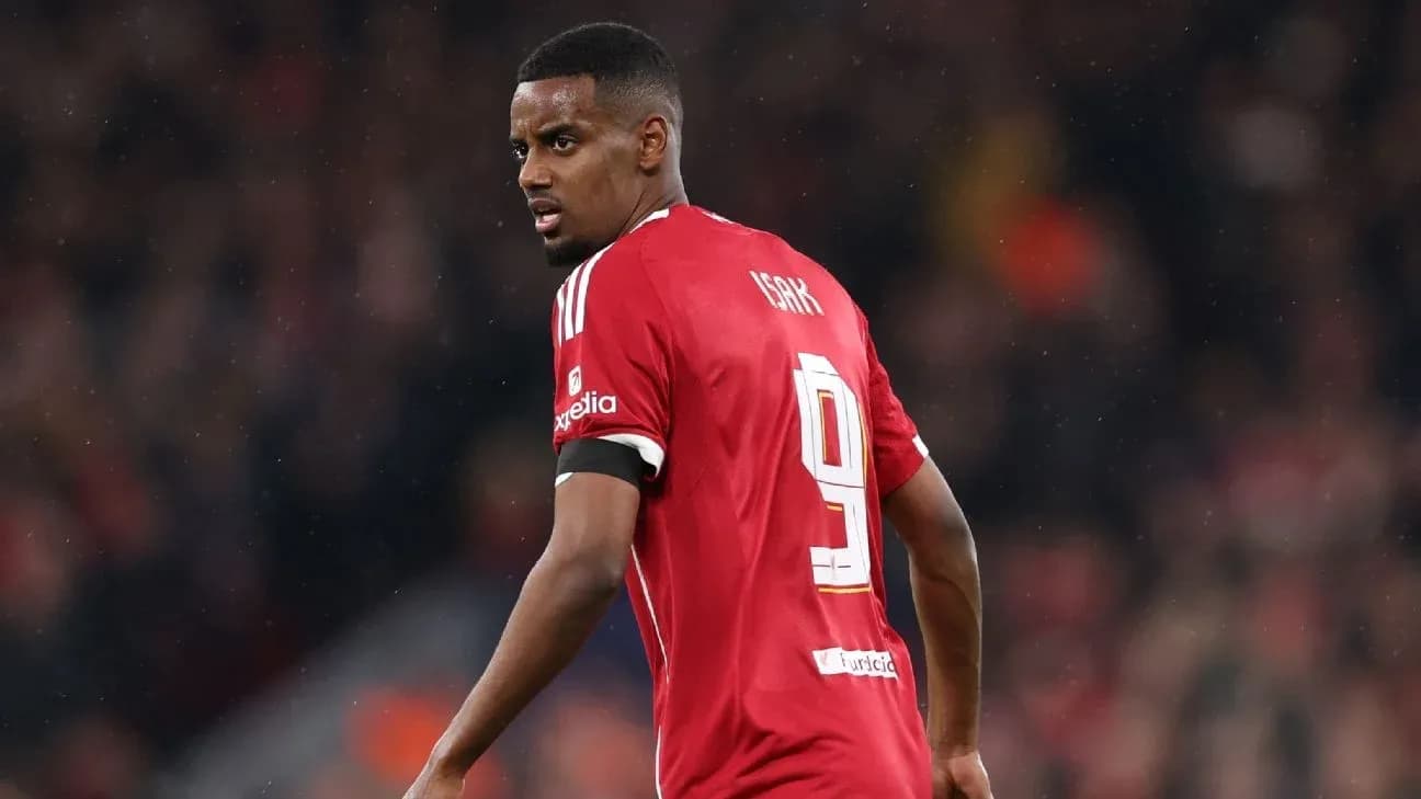 Player wearing red jersey with number 9 Player wearing red jersey with number 9