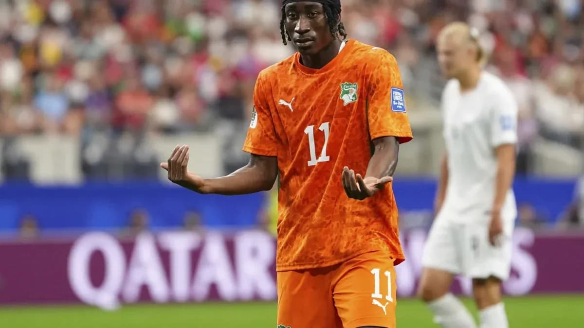 Ivorian player gesturing during a match Ivorian player gesturing during a match