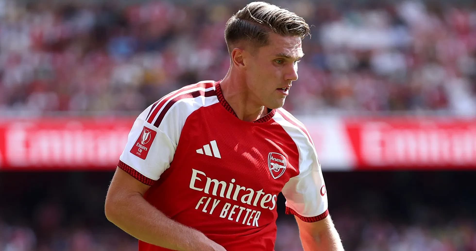 Player in Arsenal kit during a match Player in Arsenal kit during a match