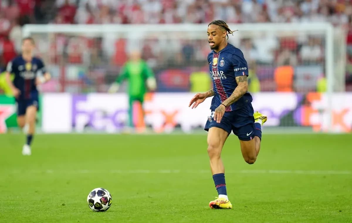 Player running with ball during UEFA match Player running with ball during UEFA match