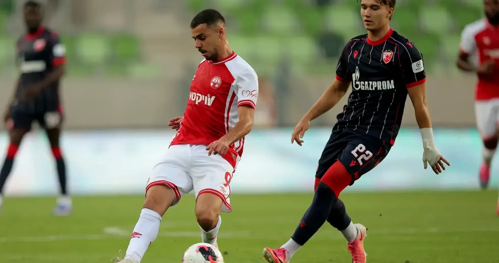 FK Crvena Zvezda player kicking the ball FK Crvena Zvezda player kicking the ball