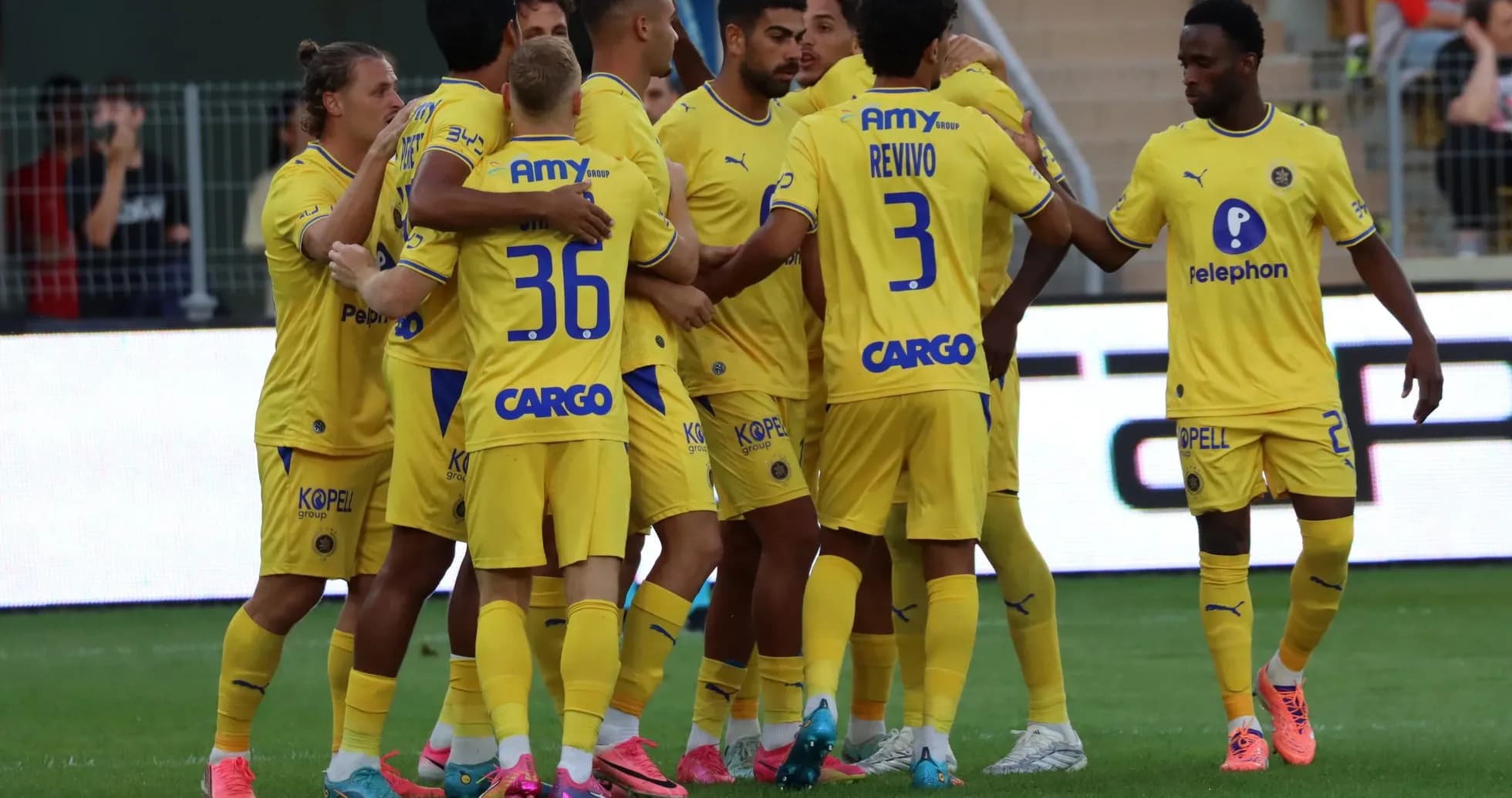 Maccabi Tel Aviv players celebrating a goal Maccabi Tel Aviv players celebrating a goal