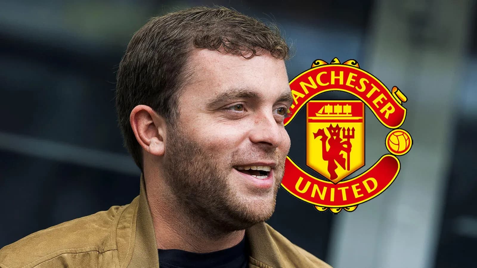 Person smiling with Manchester United logo in background Person smiling with Manchester United logo in background