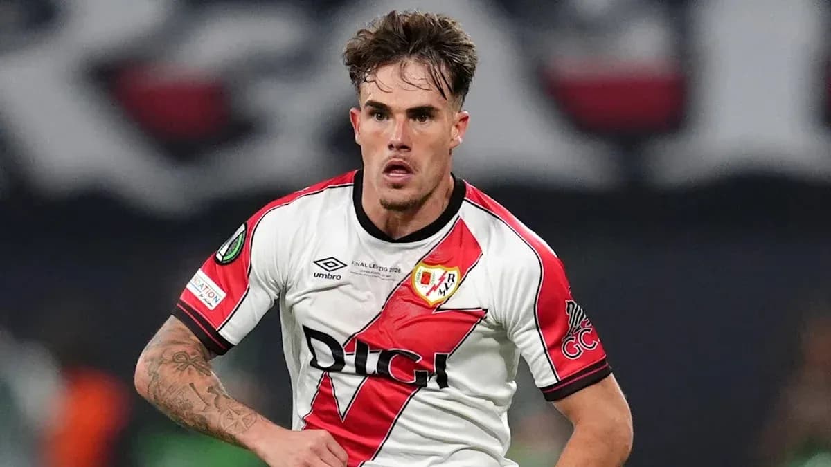 Player in Rayo Vallecano jersey running during match Player in Rayo Vallecano jersey running during match