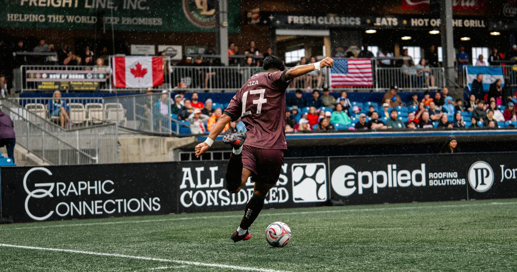 Player taking a corner kick during match Player taking a corner kick during match