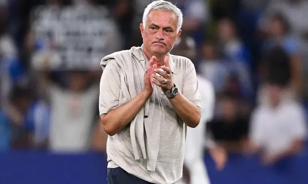 Manager clapping to the crowd after the match Manager clapping to the crowd after the match