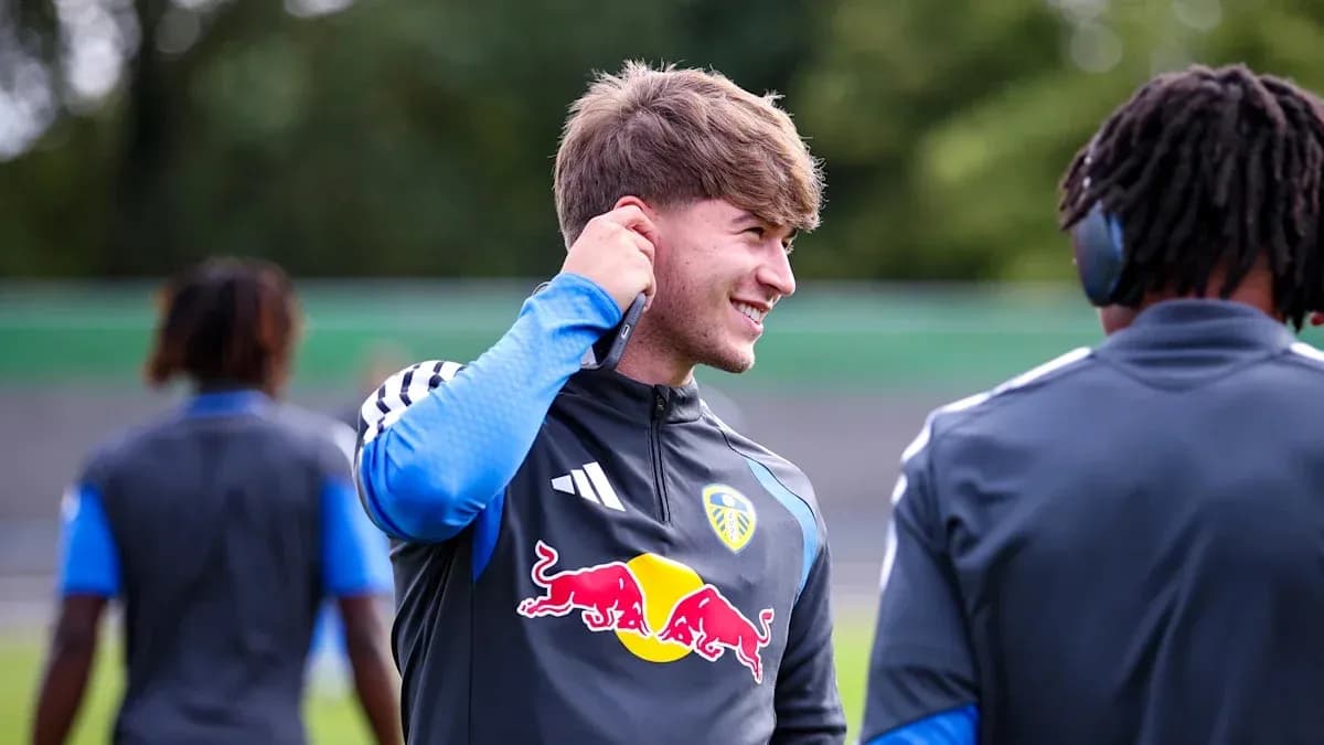 Player adjusting earphone during training session Player adjusting earphone during training session