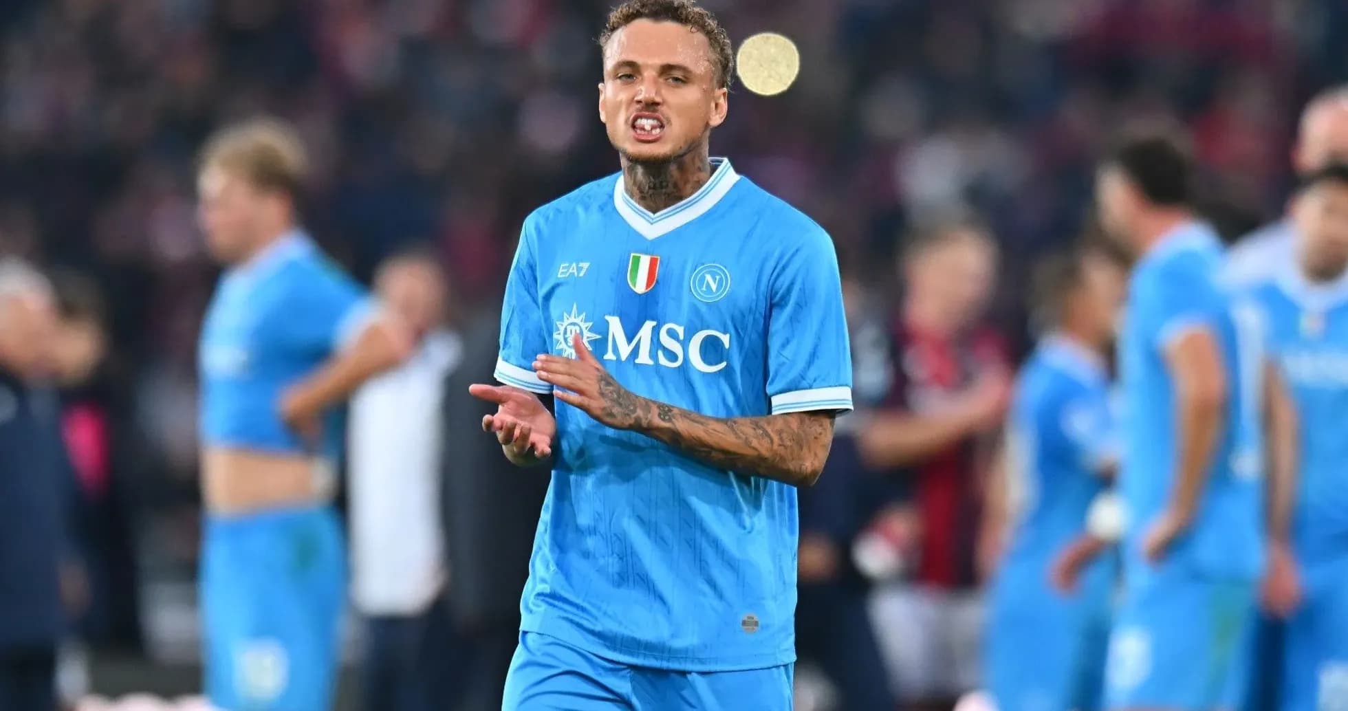 Player gesturing on the field during a match Player gesturing on the field during a match