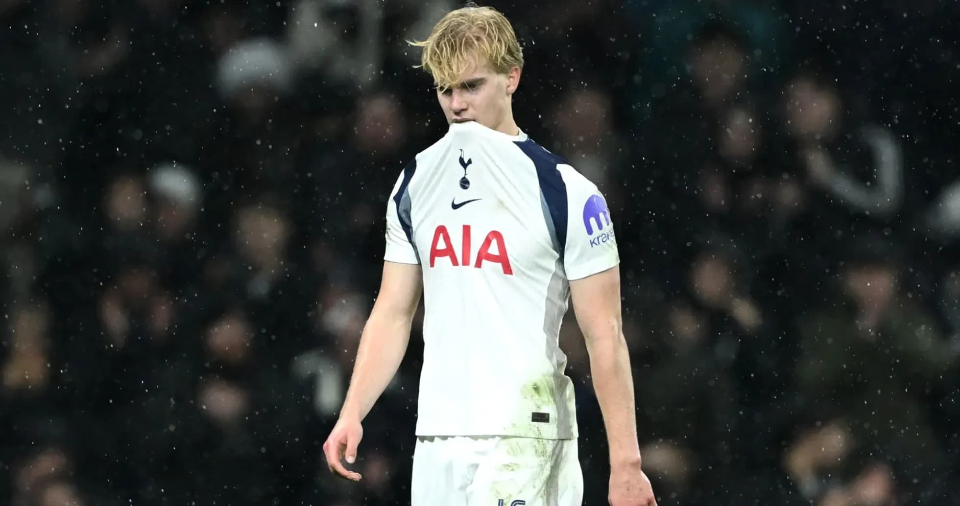 Player in Tottenham kit looking dejected on field Player in Tottenham kit looking dejected on field