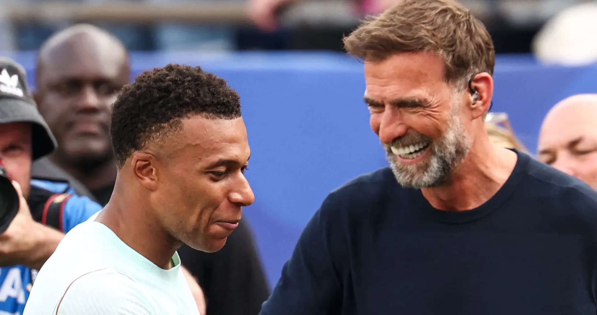 Kylian Mbappé and Jürgen Klopp sharing a moment Kylian Mbappé and Jürgen Klopp sharing a moment