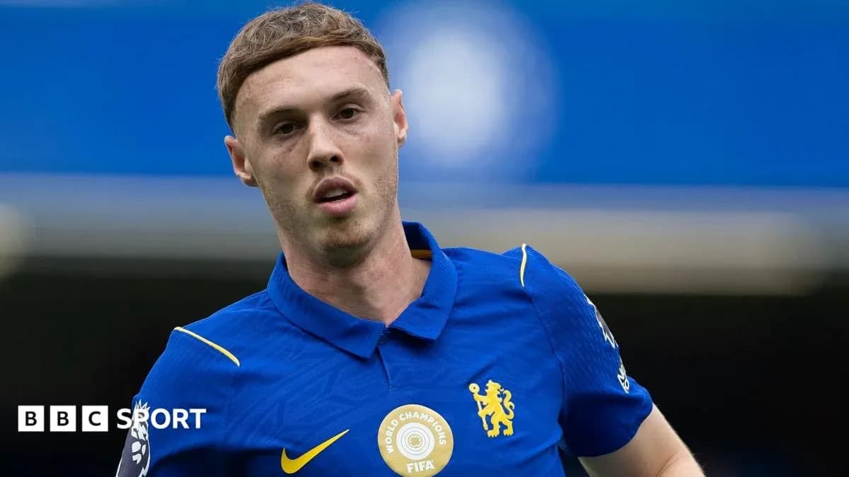 Player in blue kit during match at stadium Player in blue kit during match at stadium