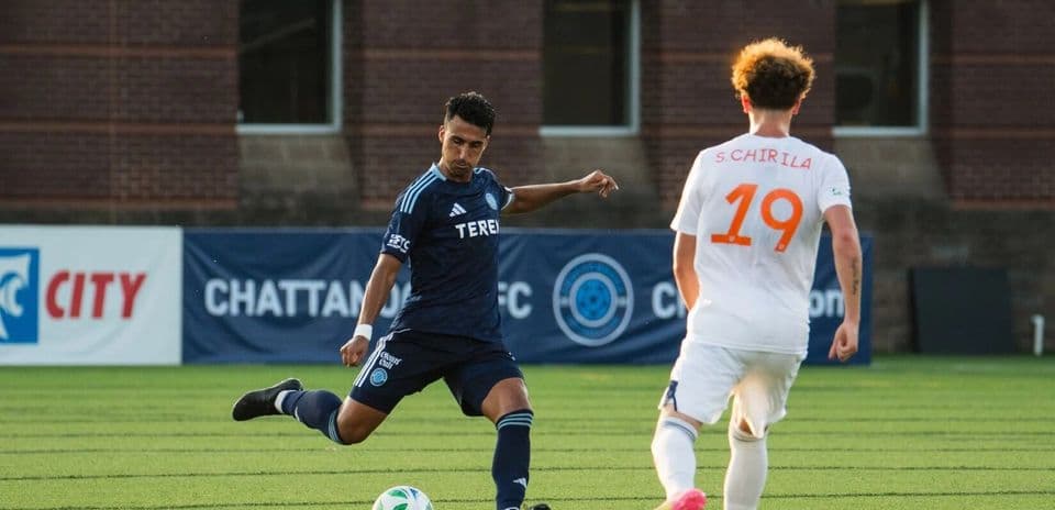 Player kicking ball during FC Cincinnati II match Player kicking ball during FC Cincinnati II match