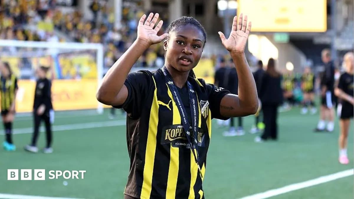 Player waving on the pitch after the match Player waving on the pitch after the match