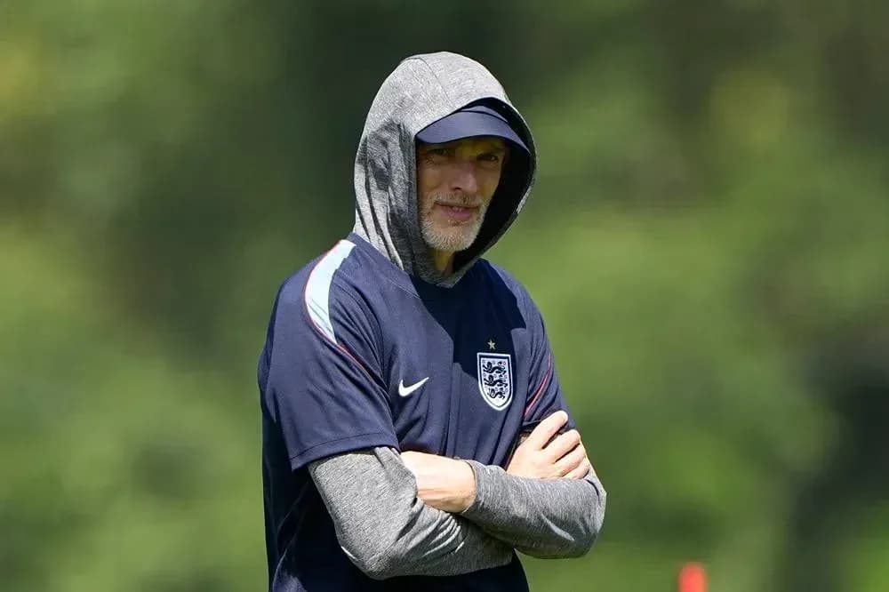 Coach observing training session with hooded sweatshirt Coach observing training session with hooded sweatshirt