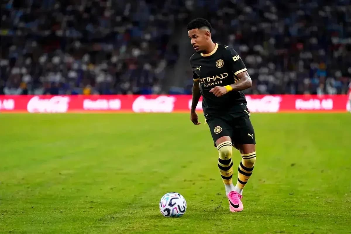 Player dribbling the ball on the field Player dribbling the ball on the field