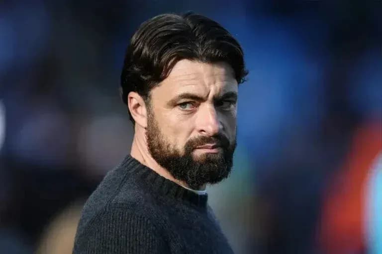 Man with beard looking away from camera Man with beard looking away from camera